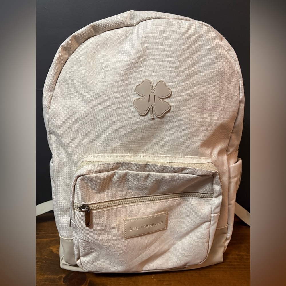 Lucky Brand Cream Backpack with Front Pocket and Interior Laptop Slip Pocket